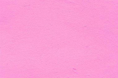 Pembe bir sıva arka plan kaplamalı ve boyalı dış, kaba dökme çimento ve beton duvar doku, dekoratif rustik kaplama