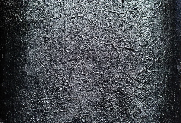 Texture of dark black glossy painted wall