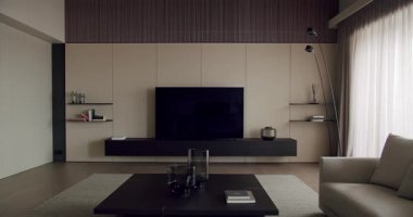 Elegant and simplistic modern living room featuring neutral tones, sleek furniture design, and a clean layout. Ideal for contemporary interior design themes. Modern Minimalist Living Room