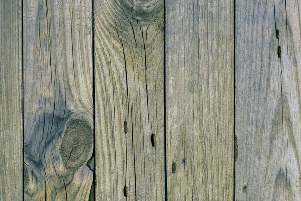 古い灰色の亀裂の多くで木の板 — ストック写真
