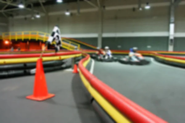 Indoor Kart Rennen Auf Der Kartbahn Unscharfes Hintergrundbild — Stockfoto