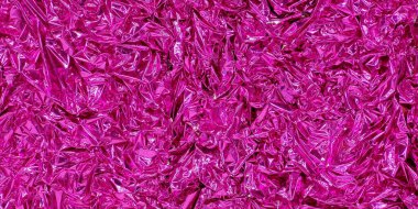 Parlak folyo filminin buruşuk kıpkırmızı arka planı. Arkaplan dokusu üst görünümü.