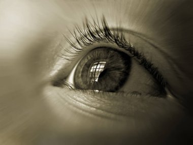 Çocuğun gözü, pencerenin yansıması olan yakın plan.