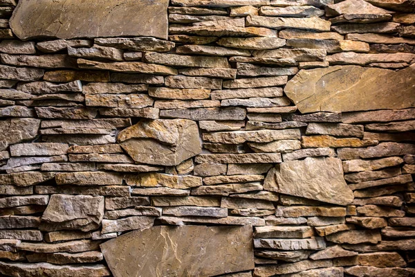 Hintergrundstruktur Einer Wand Aus Länglichen Steinen Verschiedenen Größen Von Gelber — Stockfoto