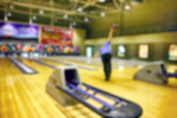 Blurred image of colorful bowling arena with circle light or bokeh. Concept for blur background, competition, hobby, team, defocus