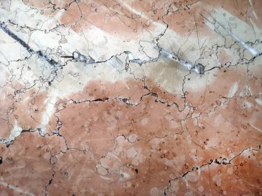 Kırmızı-kahverengi mermer. Doğal doku arka planı. Yakın plan.