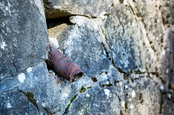 Old Rusty Pipe Sticks Out Stone Wall Impotence Genital Diseases — 스톡 사진