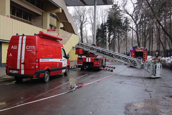 Fire fighting headquarters and fire ladders in Moscow / Firefightings vehicles are standing near the building during the exercises EMERCOM of Russia in Moscow, March 21, 2018