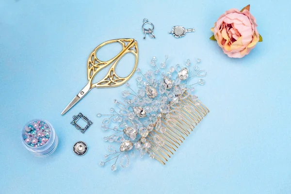 Beautiful wedding accessories and sewing accessories on a plain background, macro still life, items from the wedding salon