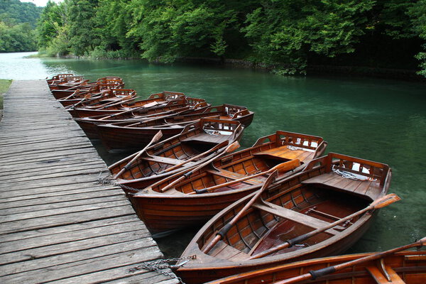 Boats on the lake / Several of wooden boats on the lake