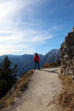Woman standing in the mountains