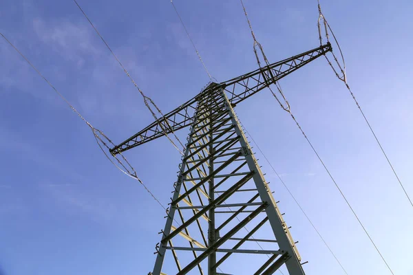 Transmission line on background of blue sky — Stock Photo, Image