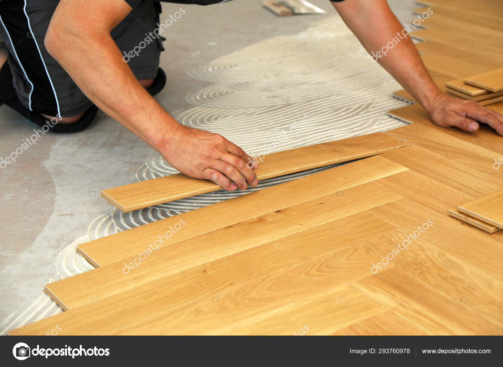 Worker Laying Parquet Flooring, How Long To Lay Parquet Flooring
