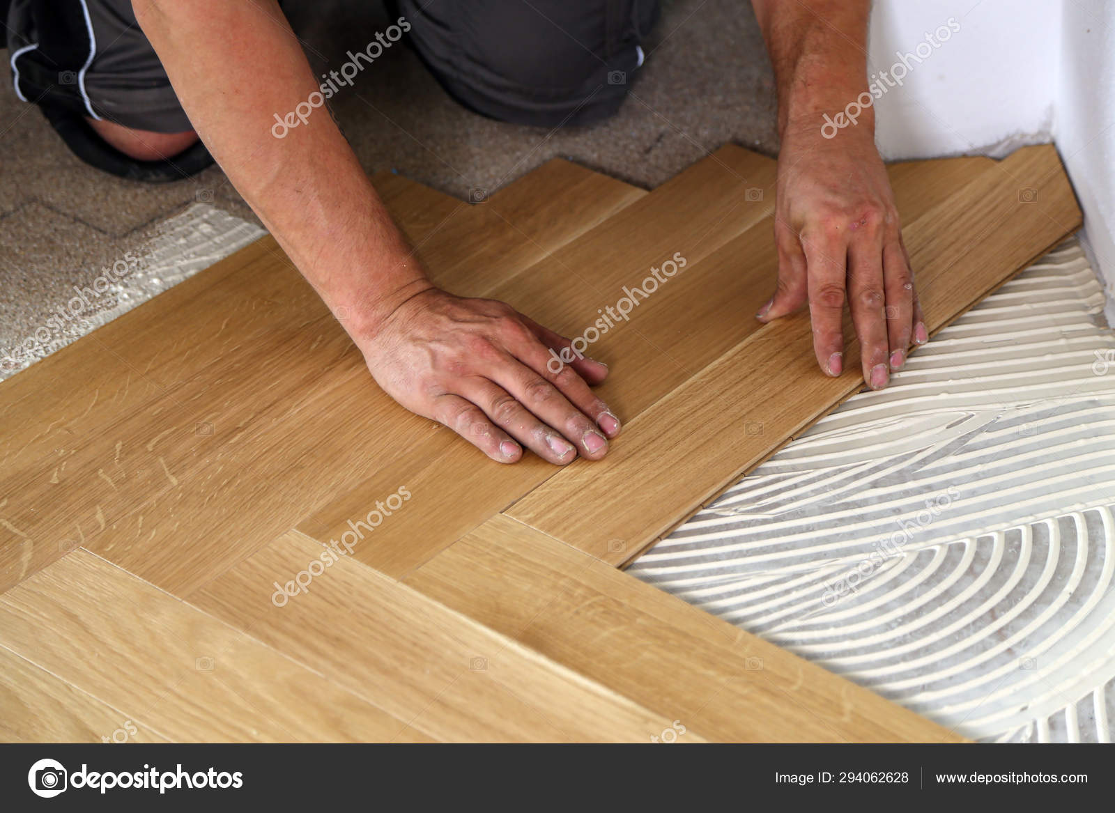 Worker Laying Parquet Flooring Worker Installing Wooden Laminate