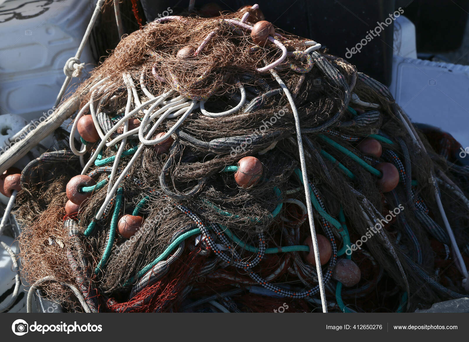 Pile Commercial Fishing Net Cords Floats Stock Photo by ©Malleo 412650276