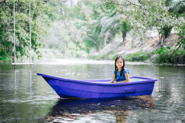 Portrait Little Asian Girl Sitting Blue Boat Nature Water — Stock Photo, Image
