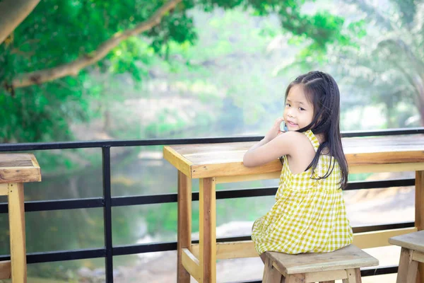 Little Asian Girl Sitting Chair Wooden Table Restaurant — Stock Photo, Image