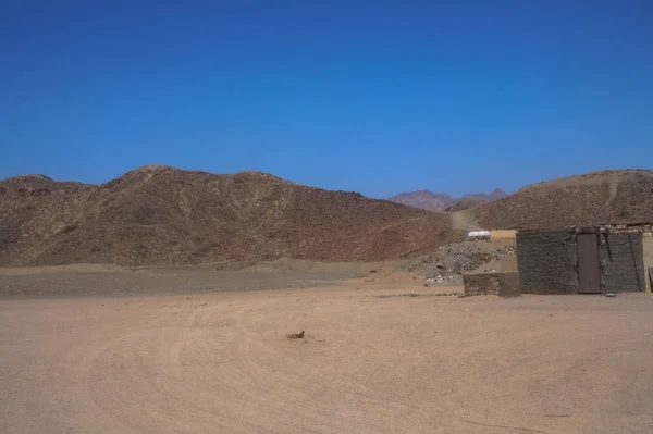 Mountain dry desert during the holidays. Types of Egyptian sands during a safari. Hurghada and Cairo Asia. Stock photo for design