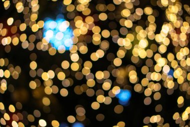 Noel arkaplanı, çelenkler ve bokeh. Çok renkli bir yeni yıl resmi. Tasarım için soyut resim