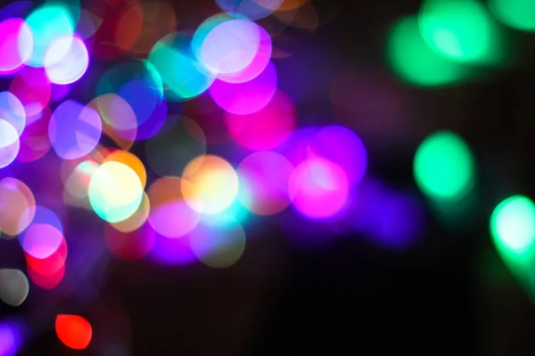 Beautiful Christmas background with garlands and bokeh. New year  multi-colored picture. Abstract photo image for design — ストック写真