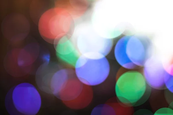 Fundo de Natal bonito com guirlandas e bokeh. Ano Novo imagem multi-colorida. Imagem de foto abstrata para design — Fotografia de Stock