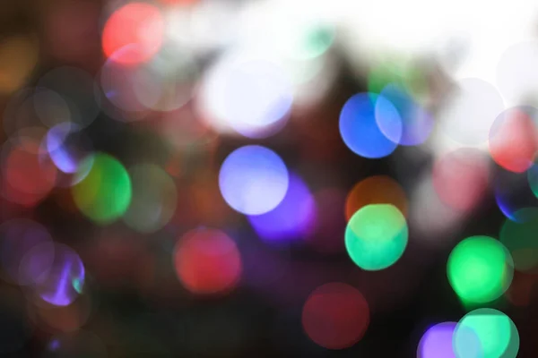 Beautiful Christmas background with garlands and bokeh. New year  multi-colored picture. Abstract photo image for design — ストック写真