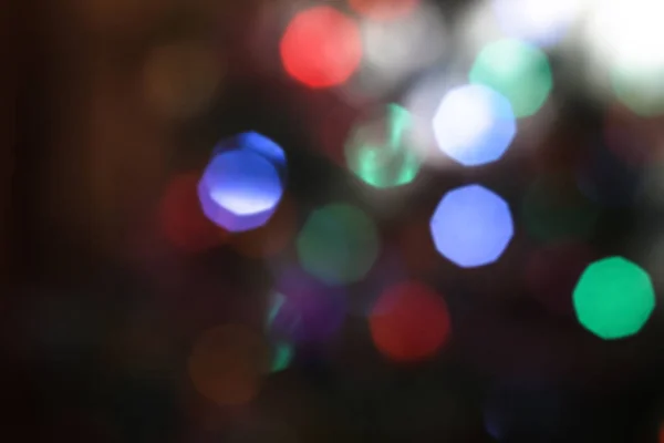 Beautiful Christmas background with garlands and bokeh. New year  multi-colored picture. Abstract photo image for design — ストック写真