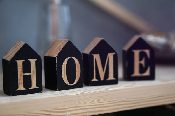 Iscrizione di piccoli cubi neri. La casa è come un sogno e un obiettivo della vita. Comfort familiare . — Foto Stock