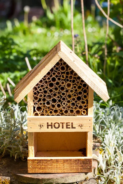 Bee and insect hotel in a garden