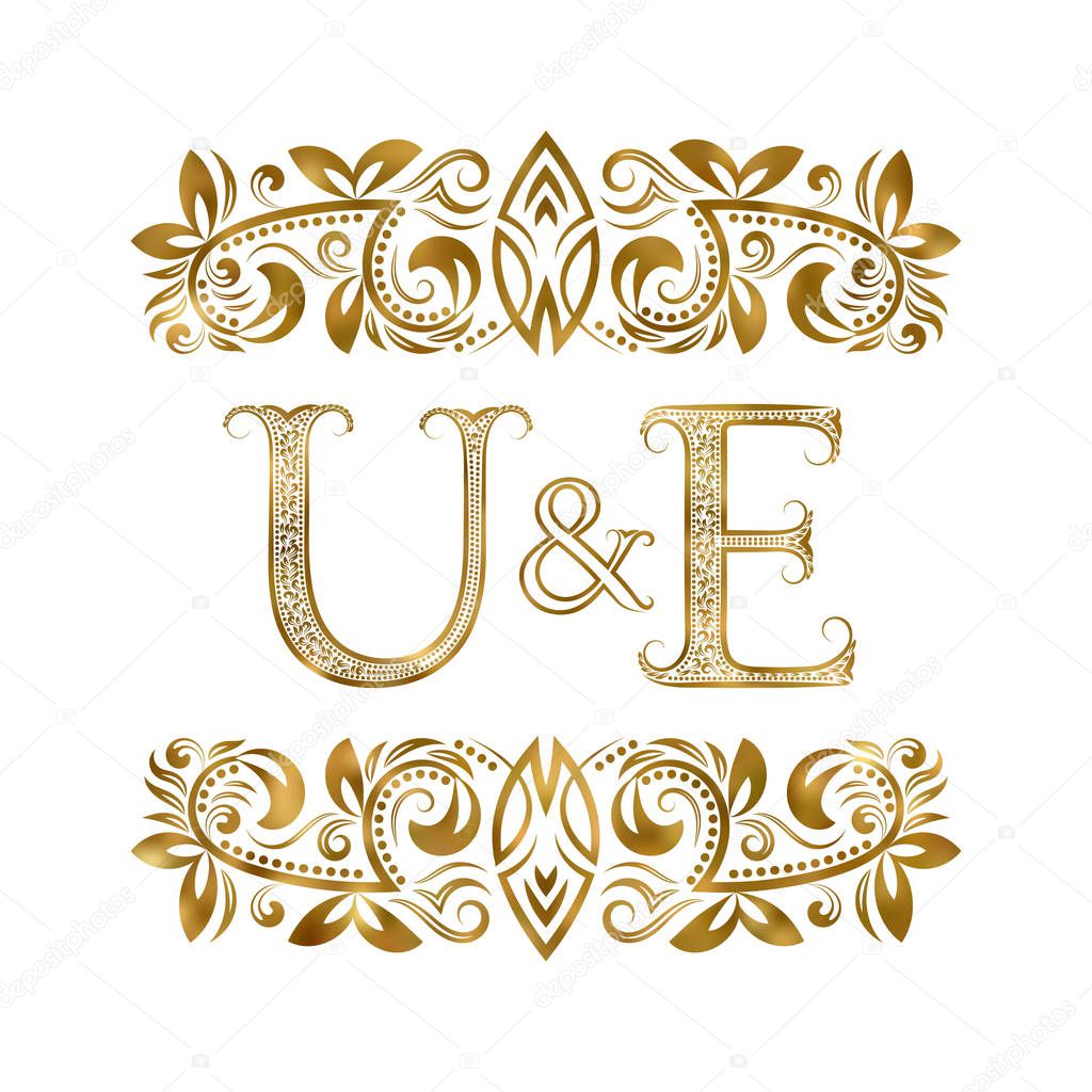 U and E vintage initials logo symbol. The letters are surrounded by ornamental elements. Wedding or business partners monogram in royal style.