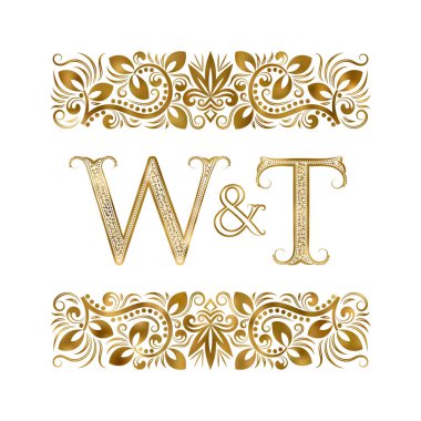 W ve T vintage baş harfleri logo sembolü. Harfleri süs öğeleri tarafından çevrili. Düğün ya da iş ortakları monogram kraliyet tarzı.