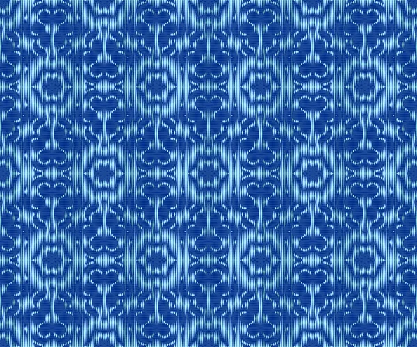 Tissu à motifs ethniques indigo teint ikat motif sans couture . — Image vectorielle