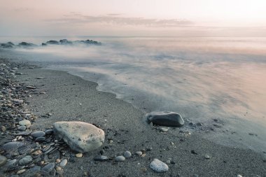 Yalı yatay bir kadeh. Bir uzun çekim hızı bir sütlü deniz efekti oluşturmak için kullanılır.