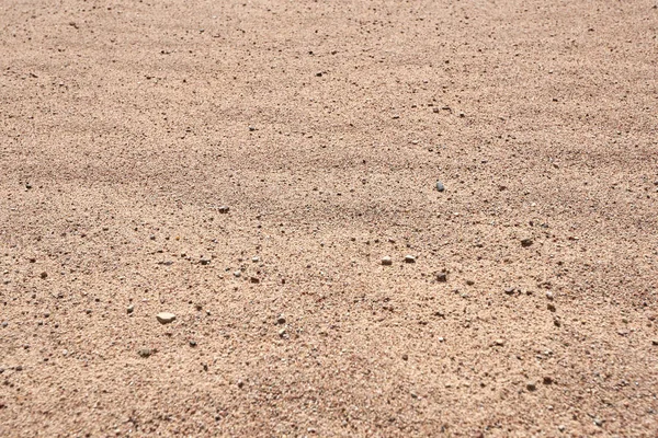 砂の質感。ベージュ砂の背景. — ストック写真