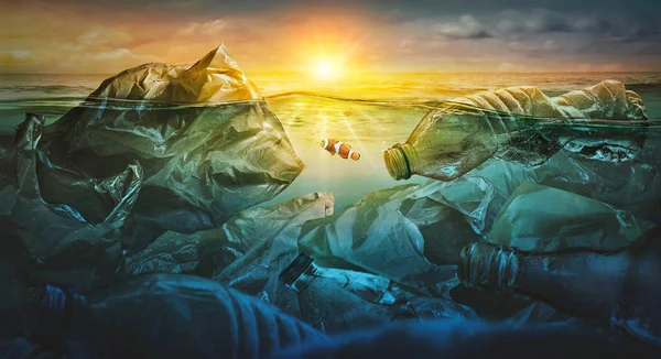 Fish swims among plastic bag ocean pollution. Environment concept