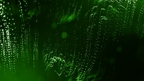 Dynamická pozadí abstraktní zářící částic s zářící bokeh jiskří. Tmavě zelená složení s kmitajícími světelná částice. Science-fiction. Hladké animace smyčkou. 4