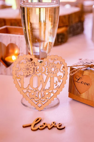 Love concept.  Champagne glass with love text on accessories