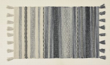 El örgüsü örülmüş ve örülmüş halı, yüksek çözünürlüklü moda desenleri ve renkleri olan halılar