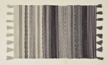 El örgüsü örülmüş ve örülmüş halı, yüksek çözünürlüklü moda desenleri ve renkleri olan halılar