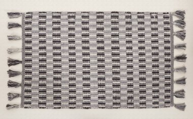 El örgüsü örülmüş ve örülmüş halı, yüksek çözünürlüklü moda desenleri ve renkleri olan halılar