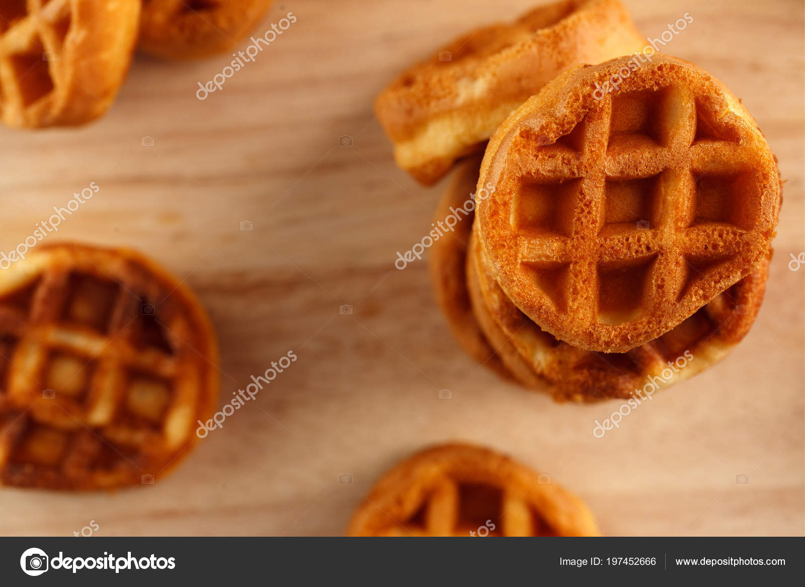 https://st4.depositphotos.com/5306236/19745/i/1600/depositphotos_197452666-stock-photo-circle-mini-waffles-wooden-cutting.jpg