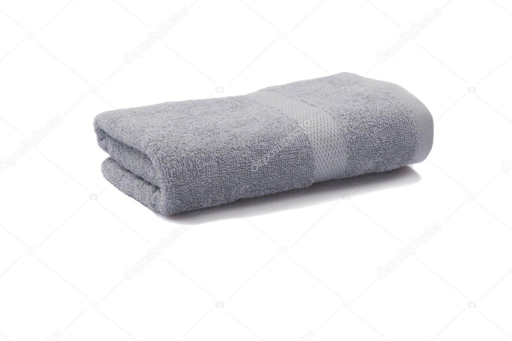 light gray towel rolled isolated on white background