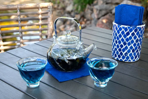 Butterfly pea blue tea. blue tea on a light sunny background