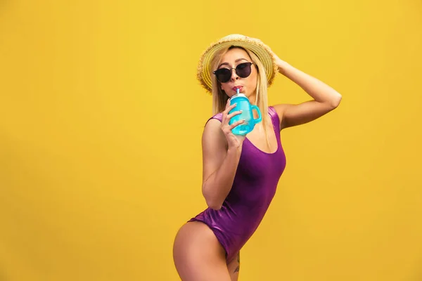 Cheerful woman in hat with drinking jar — Stock Photo, Image