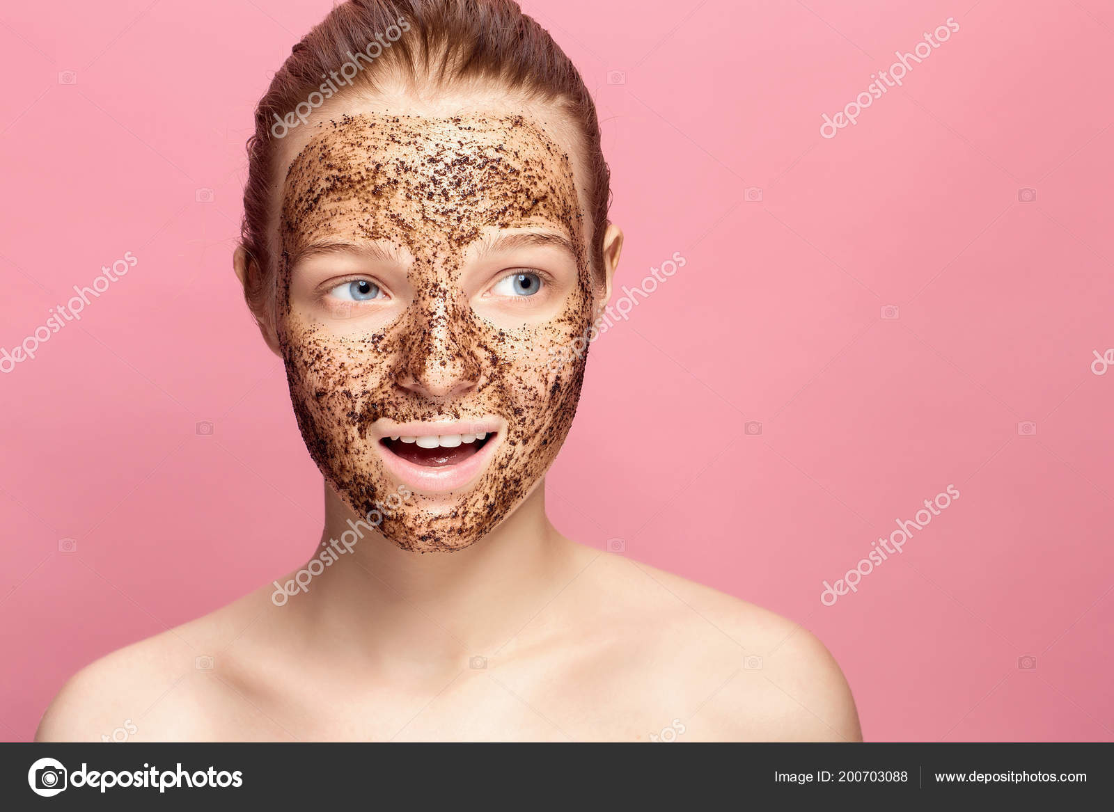 Face Skin Scrub. Portrait Of Sexy Smiling Female Model Applying Natural