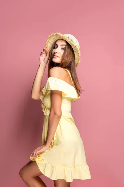 Sensual woman in dress and hat — Stock Photo, Image