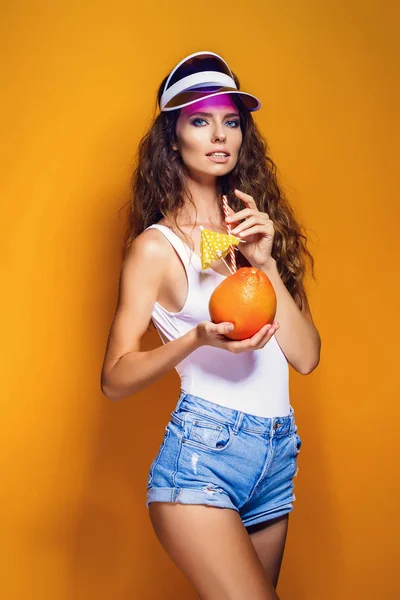 Sensual woman with juicy fruit — Stock Photo, Image