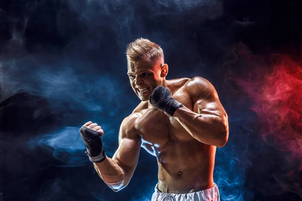 Muscular topless fighter in boxing gloves — Stock Photo, Image