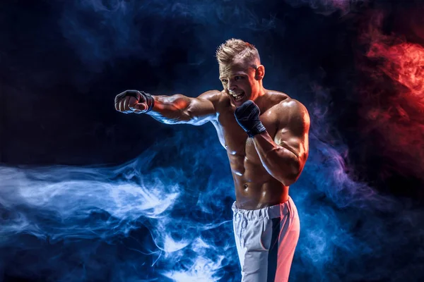 Muscular topless fighter in boxing gloves — Stock Photo, Image