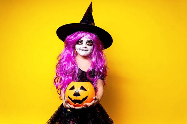 Girl in witch Halloween costume — Stock Photo, Image